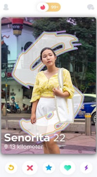 a woman in a yellow shirt is posing for a photo